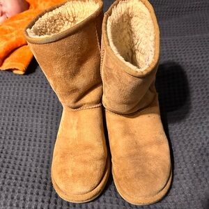 Women’s tan calf-length UGGS